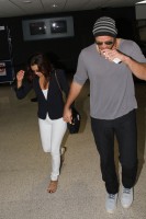 Ева Лонгория. Ева Лонгория и ее бойфренд Эрнесто Аргуэлло прибыли в Париж.